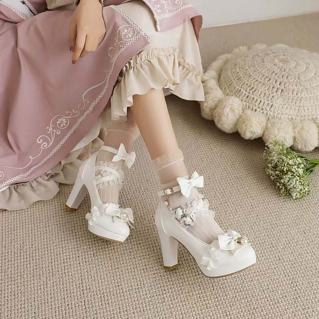 Design Concept:

These charming Lolita shoes are crafted to combine elegance and playful princess-inspired charm. Made from high-quality materials, each pair features delicate lace detailing and a sweet ribbon accent on the front, adding a feminine touch. Designed with a rounded toe and an 8cm sturdy heel, they provide both height and stability while ensuring comfort for extended wear. Perfect for daily Lolita outfits, tea parties, or special occasions. Available in four versatile colors—black, white, beige