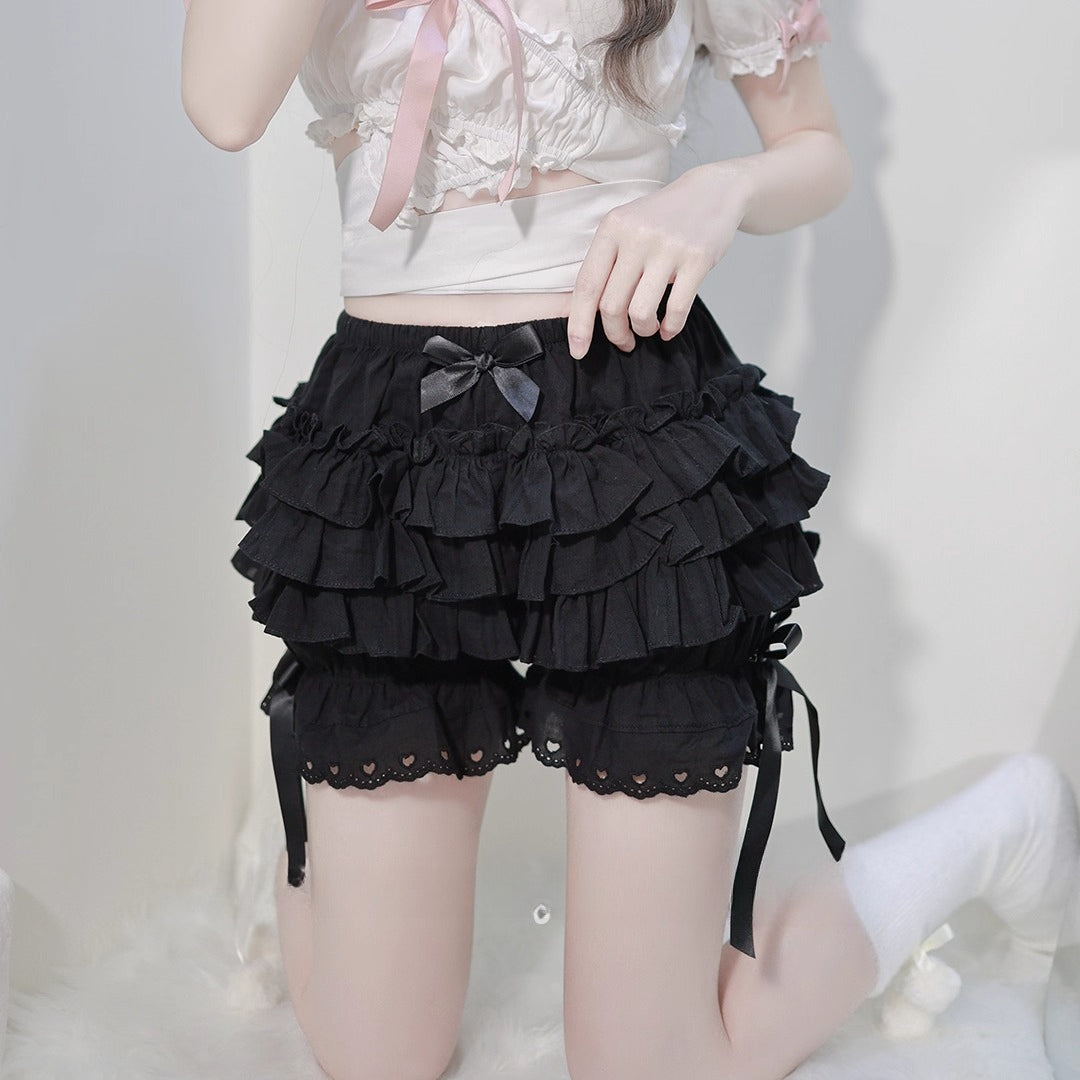 Design Concept:
These Lolita shorts in white and black feature a charming pumpkin silhouette with layered puffy design, bringing a playful touch to your daily outfits. The addition of delicate bow accents enhances the sweet Lolita aesthetic, making them both cute and stylish.&nbsp;Crafted from lightweight and breathable fabric, they are designed to provide comfort and security while doubling as undershorts for skirts or dresses. The multi-layered puffy structure not only ensures volume and shape but also ad