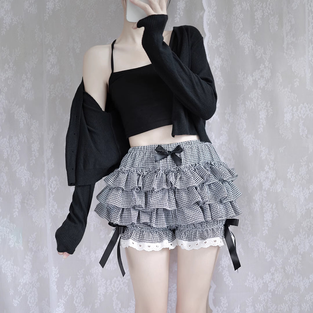 Design Concept:
These Lolita shorts in white and black feature a charming pumpkin silhouette with layered puffy design, bringing a playful touch to your daily outfits. The addition of delicate bow accents enhances the sweet Lolita aesthetic, making them both cute and stylish.&nbsp;Crafted from lightweight and breathable fabric, they are designed to provide comfort and security while doubling as undershorts for skirts or dresses. The multi-layered puffy structure not only ensures volume and shape but also ad