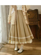 Design Concept:
This Lolita skirt in classic brown and khaki tones is crafted with a soft, flowing fabric, featuring delicate lace trim along the hemline. The long A-line silhouette combines vintage elegance with everyday practicality, offering a flattering high-waist design that elongates the figure. Its versatile solid color design makes it easy to pair with blouses or coats, creating both simple daily outfits and refined Lolita coordinates. Perfect for autumn gatherings, tea parties, or casual outings, t