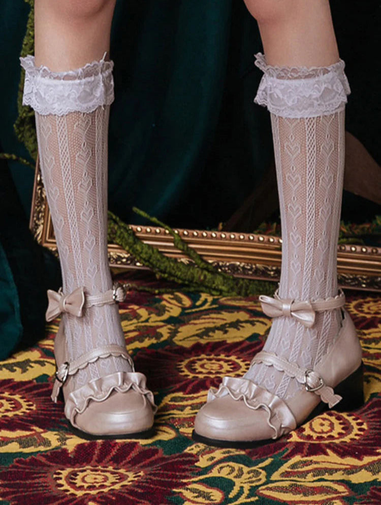Design Concept:


These Lolita socks combine elegance with playful charm. Crafted in black or white, they feature heart-shaped lace detailing and a hollow mid-tube design, adding a delicate and whimsical touch to any outfit. The stretchy material ensures a comfortable fit while maintaining their shape, making them perfect for pairing with skirts, dresses, or cosplay ensembles. Ideal for completing sweet, romantic, or classic Lolita looks, these socks are both stylish and versatile.
