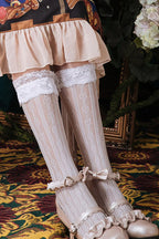 Design Concept:


These Lolita socks combine elegance with playful charm. Crafted in black or white, they feature heart-shaped lace detailing and a hollow mid-tube design, adding a delicate and whimsical touch to any outfit. The stretchy material ensures a comfortable fit while maintaining their shape, making them perfect for pairing with skirts, dresses, or cosplay ensembles. Ideal for completing sweet, romantic, or classic Lolita looks, these socks are both stylish and versatile.