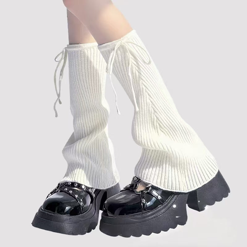 Design Concept:


The mid-calf length design (approximately 38cm) offers versatile styling options, making them ideal for pairing with wide-leg pants, JK uniforms, or standalone wear. The stackable feature enables creative layering possibilities, allowing you to express your individual style through different stacking heights and combinations. Available in four contemporary colors - Classic Black, Deep Charcoal Gray, Pure White, and Rebellious Pink - each hue represents a distinct aspect of alternative cult
