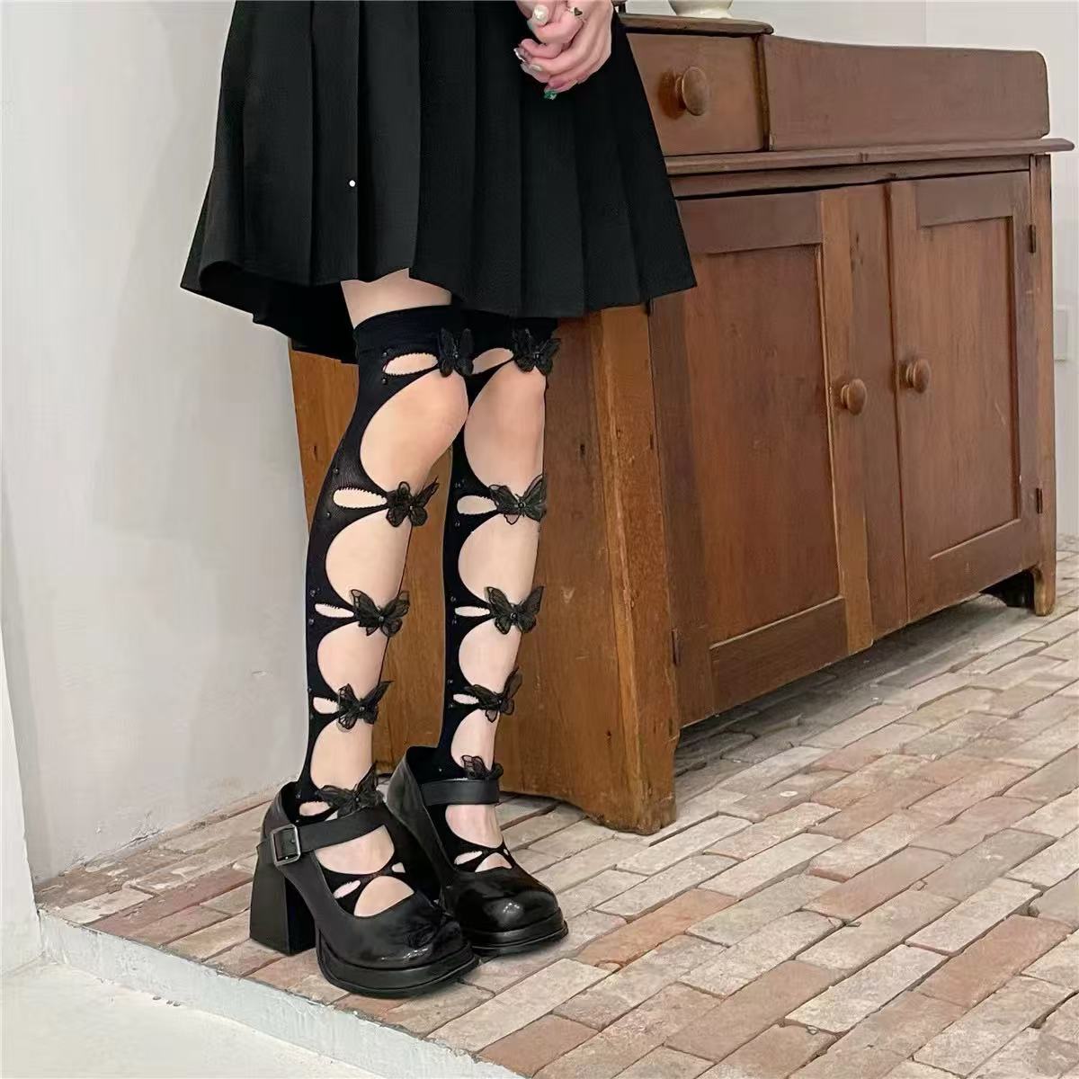 Design Concept:


Step into elegance with these Lolita stockings, available in classic white and black. Designed with delicate lace and charming hollow-out bow details, they bring a touch of sweetness and refinement to any coordinate. The soft, breathable fabric ensures comfort while maintaining a graceful fit, making them perfect for daily wear, tea parties, or themed events. Whether paired with JSKs, skirts, or dresses, these long socks complete your outfit with a timeless Lolita charm.