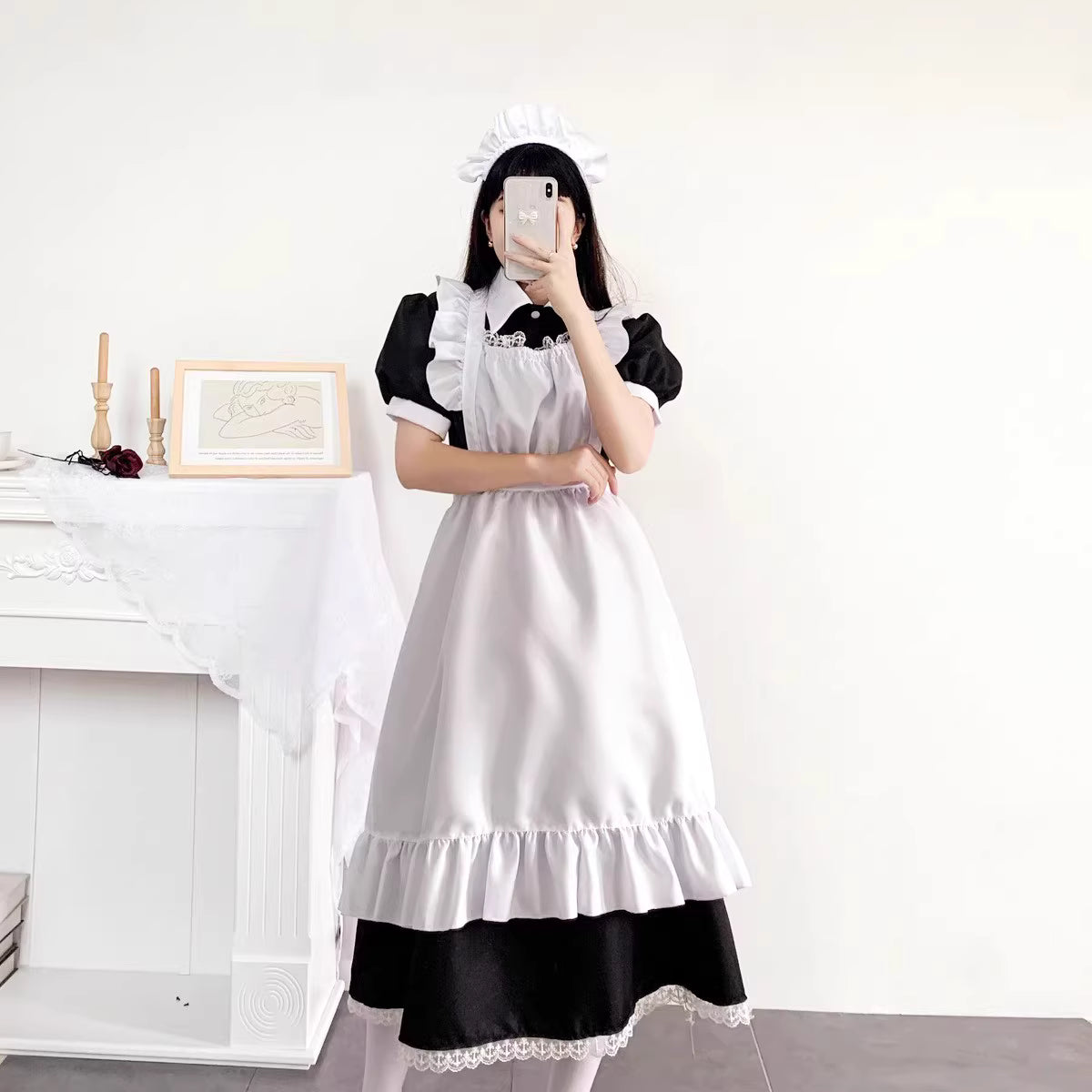 Design Concept:
This Lolita dress draws inspiration from classic English maid uniforms, featuring a delicate lace apron and elegant short sleeves. Available in light blue, dark blue, and soft pink, the dress combines a timeless silhouette with a playful, youthful charm. The high-quality fabric ensures comfort and durability, while the layered details and lace accents enhance its refined Lolita aesthetic. Perfect for daily wear, tea parties, or themed gatherings.