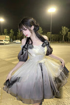 This Hime Lolita JSK dress features an ink-gradient design in soft, watercolor-inspired tones, accented with charming ribbon details and a strawberry princess motif. The short silhouette enhances a sweet and playful look, perfect for summer or spring styling. Crafted with delicate fabrics and attention to detail, this dress combines elegance with a whimsical Lolita aesthetic. Ideal for cosplay, special occasions, or completing a sweet Lolita wardrobe, it offers both style and charm.