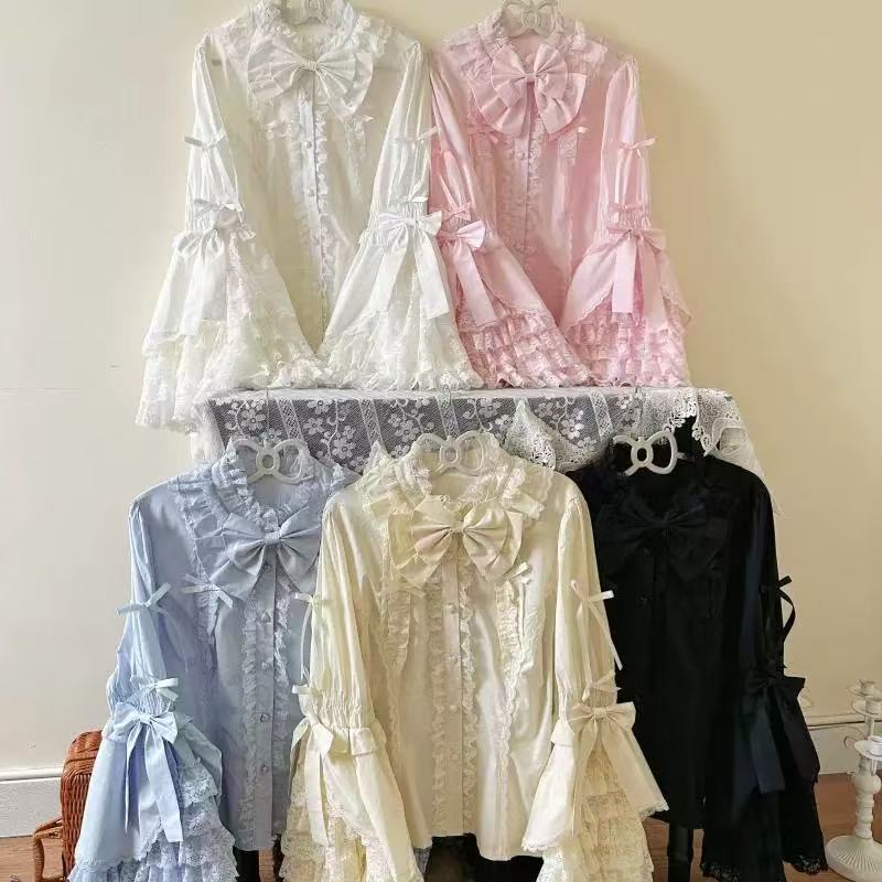 Design Concept:

This Lolita blouse in an elegant doll style features large puff sleeves and delicate lace details, combining sophistication with a charming Lolita aesthetic. The design offers a graceful and refined look suitable for layering or wearing alone. Product Details: The product includes one blouse available in four beautiful colors — black, white, apricot, and pink — providing versatile options to match different outfits and styles.