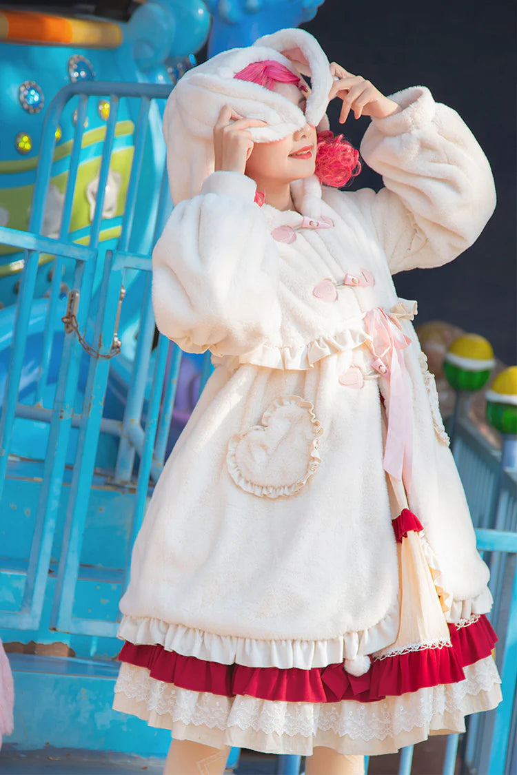 Design Concept:

This adorable Lolita longline coat brings whimsical charm to everyday wear. Crafted from soft ivory fabric, it features a playful hood adorned with long rabbit ears, delicate ruffle trim, and a charming ribbon accent at the front. The long silhouette provides both comfort and elegance, making it perfect for layering over dresses or skirts. Ideal for daily Lolita styling, this coat combines cute details with practical warmth, creating a sweet and enchanting look.