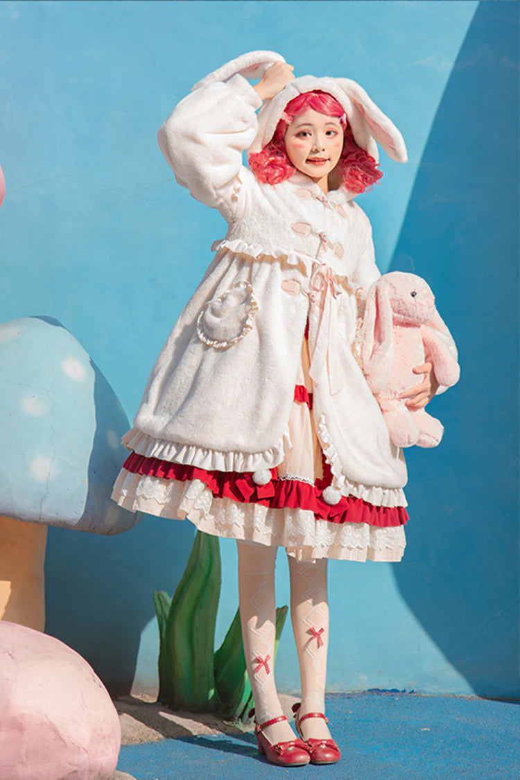 Design Concept:

This adorable Lolita longline coat brings whimsical charm to everyday wear. Crafted from soft ivory fabric, it features a playful hood adorned with long rabbit ears, delicate ruffle trim, and a charming ribbon accent at the front. The long silhouette provides both comfort and elegance, making it perfect for layering over dresses or skirts. Ideal for daily Lolita styling, this coat combines cute details with practical warmth, creating a sweet and enchanting look.