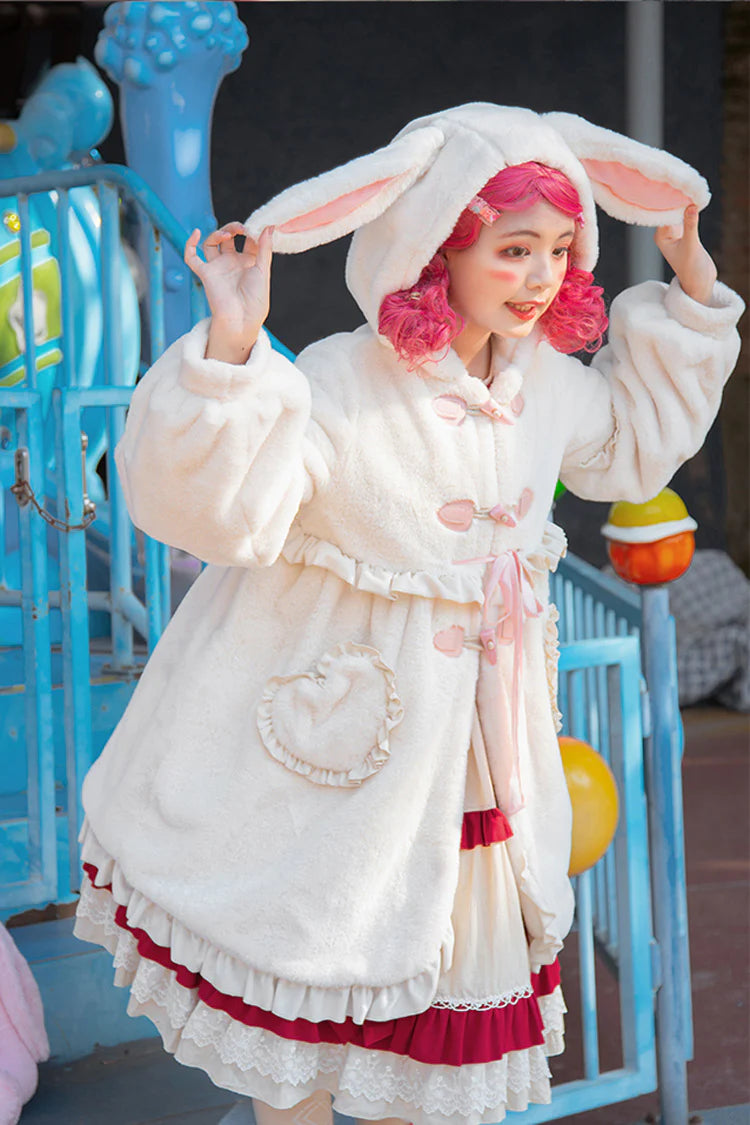 Design Concept:

This adorable Lolita longline coat brings whimsical charm to everyday wear. Crafted from soft ivory fabric, it features a playful hood adorned with long rabbit ears, delicate ruffle trim, and a charming ribbon accent at the front. The long silhouette provides both comfort and elegance, making it perfect for layering over dresses or skirts. Ideal for daily Lolita styling, this coat combines cute details with practical warmth, creating a sweet and enchanting look.