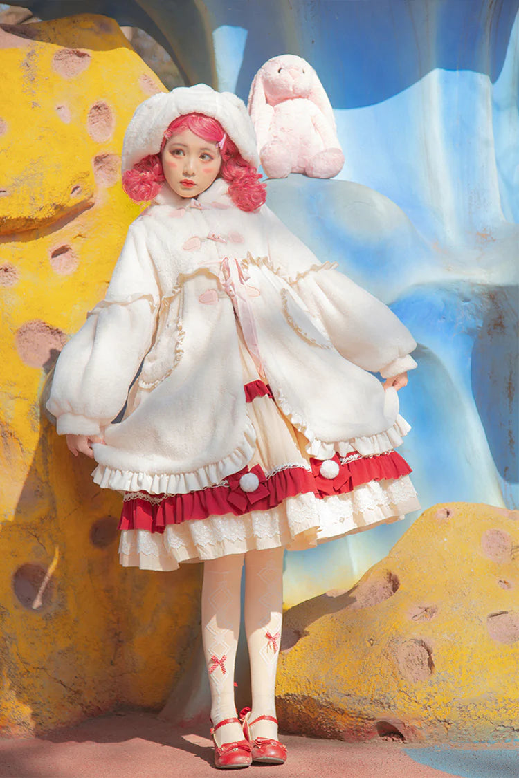 Design Concept:

This adorable Lolita longline coat brings whimsical charm to everyday wear. Crafted from soft ivory fabric, it features a playful hood adorned with long rabbit ears, delicate ruffle trim, and a charming ribbon accent at the front. The long silhouette provides both comfort and elegance, making it perfect for layering over dresses or skirts. Ideal for daily Lolita styling, this coat combines cute details with practical warmth, creating a sweet and enchanting look.