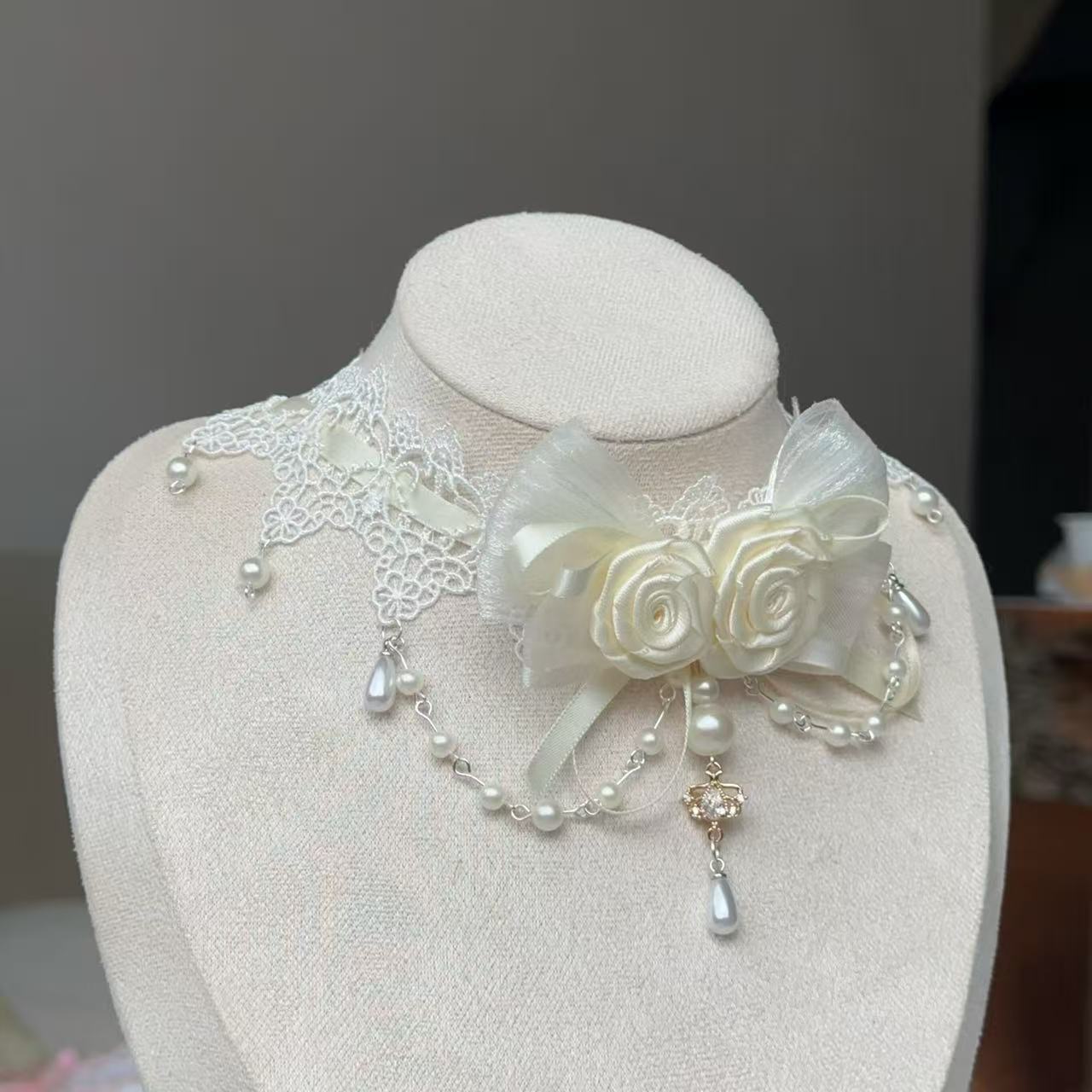 Design Concept:


Embrace a timelessly elegant and romantic aesthetic with this delicate Lolita necklace. Crafted in a soft beige hue, this piece exudes a sense of gentle sophistication, perfectly suited for Classic and Sweet Lolita styles. The necklace features a beautifully sculpted rose as the central pendant, symbolizing grace and affection. A dainty bow accent is elegantly incorporated, adding a touch of classic Lolita charm to the overall design.