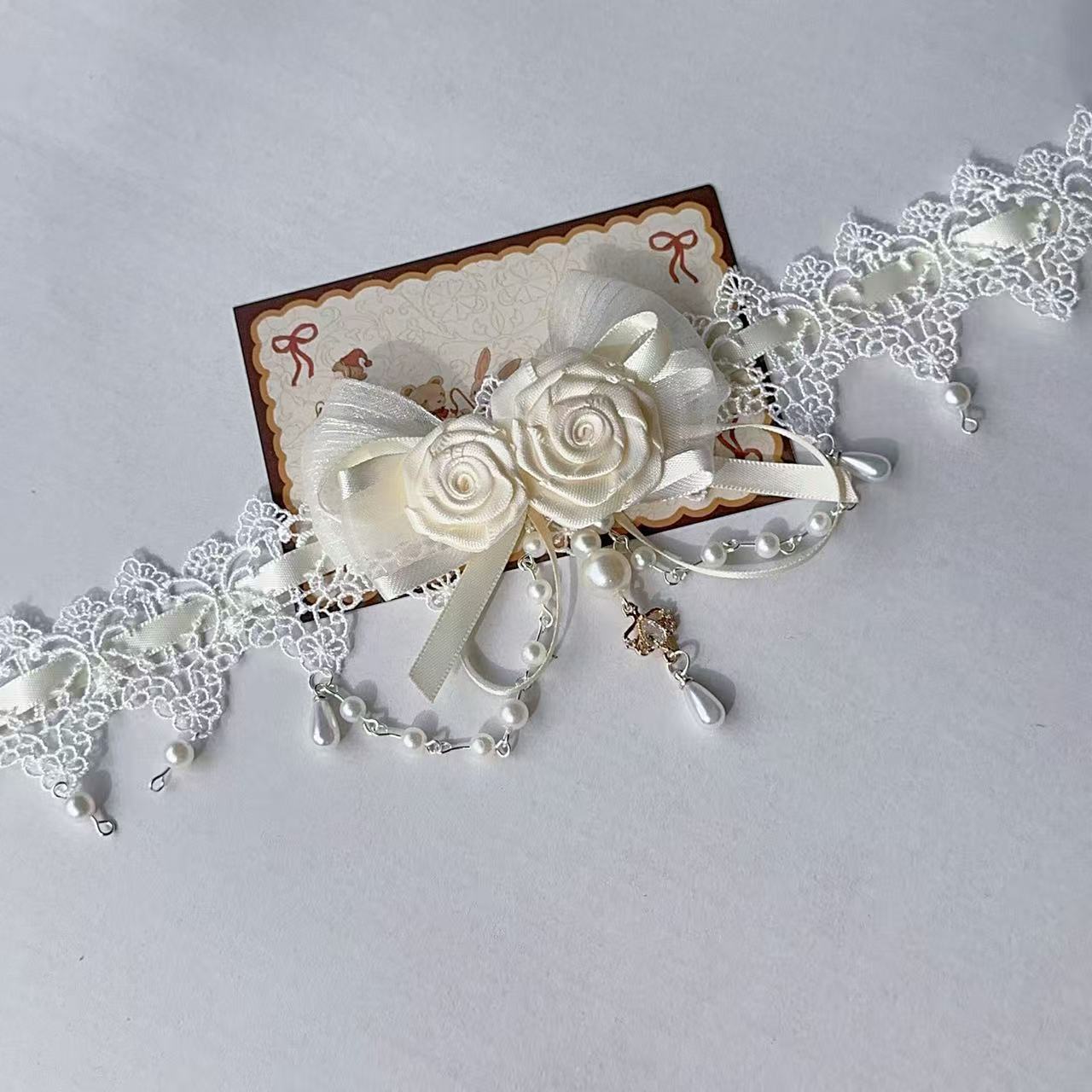 Design Concept:


Embrace a timelessly elegant and romantic aesthetic with this delicate Lolita necklace. Crafted in a soft beige hue, this piece exudes a sense of gentle sophistication, perfectly suited for Classic and Sweet Lolita styles. The necklace features a beautifully sculpted rose as the central pendant, symbolizing grace and affection. A dainty bow accent is elegantly incorporated, adding a touch of classic Lolita charm to the overall design.