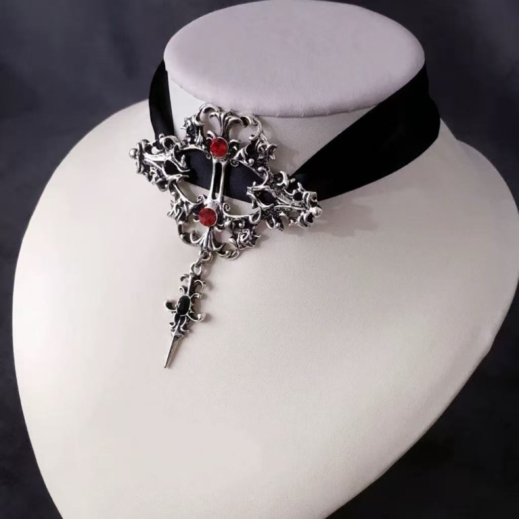 Design Concept:


Embrace a bold and alternative aesthetic with this striking Gothic Punk necklace. Crafted in a deep black hue, this choker-style piece is designed to make a statement, perfectly blending Y2K edge with subculture-inspired Lolita fashion. The centerpiece of the design is a prominent cross pendant, symbolizing a classic dark romanticism. Adding a customizable and edgy touch are the functional lace-up details, allowing you to adjust the fit for a personalized look.