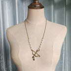 Design Concept:


Capture the essence of sweet romance with this delicately crafted Lolita necklace. The centerpiece of the design is a charming "Arrow of Love" pendant, symbolically representing Cupid's arrow and the blossoming of affection. Crafted in a warm golden tone, this piece adds a touch of classic elegance to any coord. The dainty chain and subtle design make it a perfect accessory for expressing a heartfelt and romantic sentiment within the Lolita fashion style.