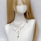 Design Concept:


This Lolita necklace features a pure white gothic choker design adorned with a cross pendant, blending elegance with a refined Lolita aesthetic. Available in two versions—the standard edition and the upgraded edition—each offers a unique style and quality, making it a versatile accessory for completing classic or gothic Lolita outfits.
