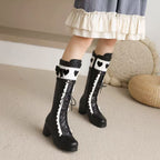 Design Concept:

Discover the perfect fusion of Gothic and Knight style with these black tall boots, expertly designed for petite women to create a slimming and lengthening silhouette. Crafted from high-quality synthetic leather with a sleek finish, these boots feature a comfortable flat heel and a convenient side zipper for easy wear. Their versatile knight boot design effortlessly complements any Lolita coordinate, adding a touch of elegant edge to your wardrobe for a truly striking statement.