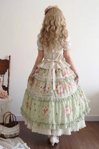 Design Concept:

This exquisite Lolita skirt is a page from a fairy tale.&nbsp;Crafted in a soft green fabric adorned with a delicate floral print, it captures the essence of a secret garden. The graceful ruffle trim adds a touch of playful movement with every step, while the classic A-line silhouette ensures a flattering fit.&nbsp;Perfect for tea parties, conventions, or any occasion where you wish to embody pure, romantic elegance.