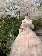 Design Concept:
Step into enchanting elegance with this Sweet Lolita apricot JSK dress in a charming short version. Featuring a sleeveless design, multi-layered ruffles, delicate floral accents, charming bows, and intricate lace, it radiates sweet and gorgeous Lolita charm. The flowing silhouette and refined details create a graceful, princess-like look, perfect for tea parties, photoshoots, or themed gatherings. Comfortable yet visually striking, this short JSK offers versatile styling options, making it a