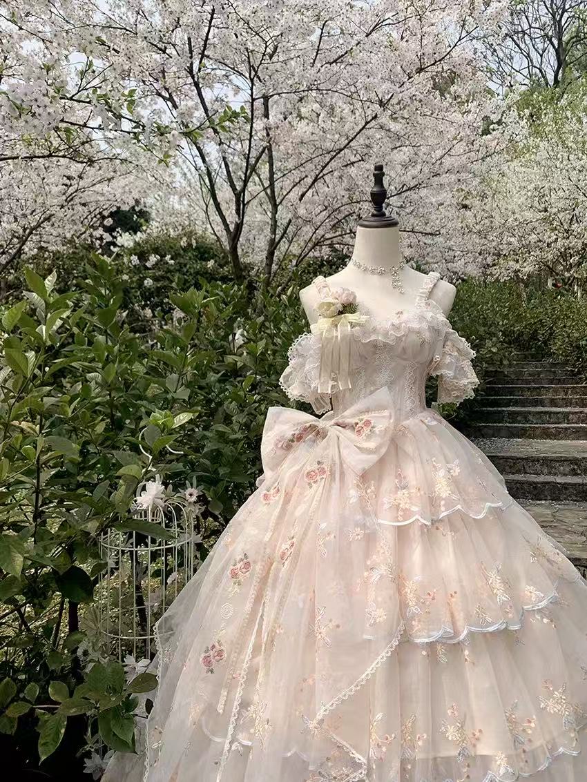 Design Concept:
Step into enchanting elegance with this Sweet Lolita apricot JSK dress in a charming short version. Featuring a sleeveless design, multi-layered ruffles, delicate floral accents, charming bows, and intricate lace, it radiates sweet and gorgeous Lolita charm. The flowing silhouette and refined details create a graceful, princess-like look, perfect for tea parties, photoshoots, or themed gatherings. Comfortable yet visually striking, this short JSK offers versatile styling options, making it a
