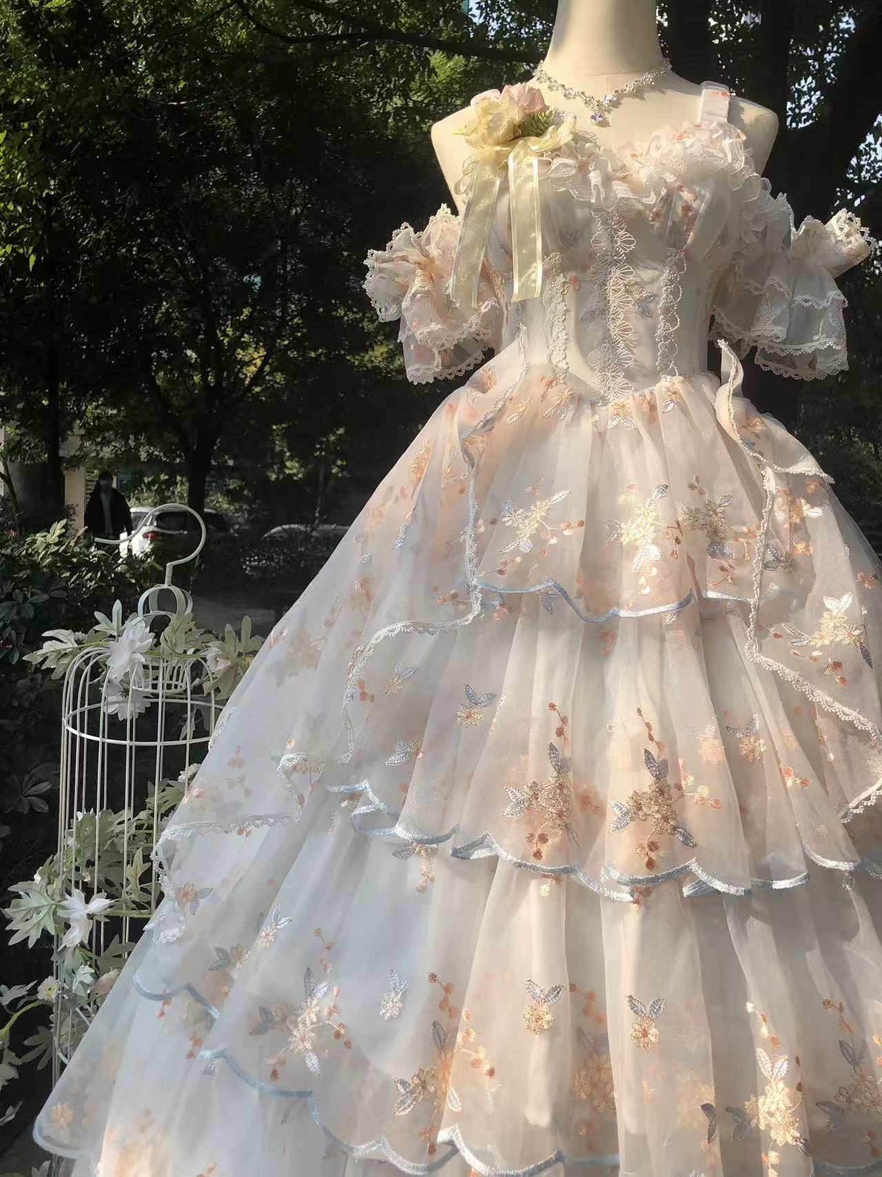 Design Concept:
Step into enchanting elegance with this Sweet Lolita apricot JSK dress in a charming short version. Featuring a sleeveless design, multi-layered ruffles, delicate floral accents, charming bows, and intricate lace, it radiates sweet and gorgeous Lolita charm. The flowing silhouette and refined details create a graceful, princess-like look, perfect for tea parties, photoshoots, or themed gatherings. Comfortable yet visually striking, this short JSK offers versatile styling options, making it a