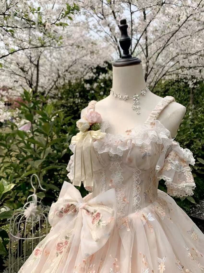 Design Concept:
Step into enchanting elegance with this Sweet Lolita apricot JSK dress in a charming short version. Featuring a sleeveless design, multi-layered ruffles, delicate floral accents, charming bows, and intricate lace, it radiates sweet and gorgeous Lolita charm. The flowing silhouette and refined details create a graceful, princess-like look, perfect for tea parties, photoshoots, or themed gatherings. Comfortable yet visually striking, this short JSK offers versatile styling options, making it a