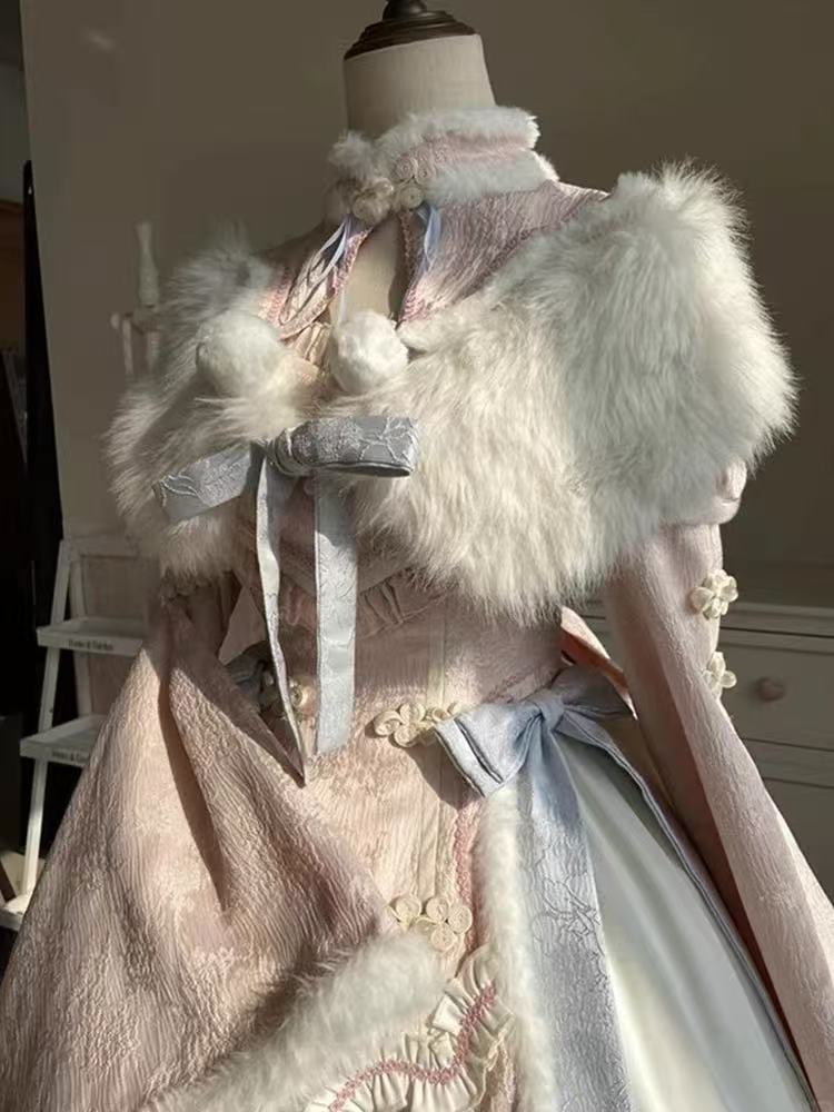 Design Concept:

This Sweet Lolita blue and pink Chinese style dress set blends festive charm with delicate Lolita elegance, creating a harmonious look perfect for Christmas, New Year, or special occasions. The combination of soft blue and pink tones brings a dreamy and playful atmosphere, while the traditional Chinese style details add a unique cultural touch. Product Details: The set includes a beautifully designed cape and a matching dress. The cape adds layers of elegance and warmth, while the dress off