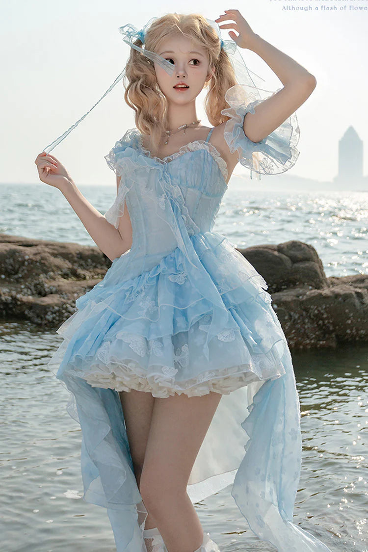 Design Concept:&nbsp;

Embrace a unique and enchanting style with this exquisite Sweet Lolita JSK dress. The beautiful blue base is elegantly adorned with delicate embroidery and intricate lace, adding a touch of refined sweetness. The design features charming ruffles and a distinctive irregular hemline, creating a dynamic and eye-catching silhouette. A key highlight of this dress is the elegant detachable train, which adds a dramatic and graceful touch for special occasions, allowing you to customize your 