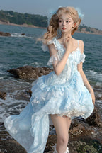 Design Concept:&nbsp;

Embrace a unique and enchanting style with this exquisite Sweet Lolita JSK dress. The beautiful blue base is elegantly adorned with delicate embroidery and intricate lace, adding a touch of refined sweetness. The design features charming ruffles and a distinctive irregular hemline, creating a dynamic and eye-catching silhouette. A key highlight of this dress is the elegant detachable train, which adds a dramatic and graceful touch for special occasions, allowing you to customize your 