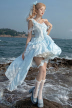 Design Concept:&nbsp;

Embrace a unique and enchanting style with this exquisite Sweet Lolita JSK dress. The beautiful blue base is elegantly adorned with delicate embroidery and intricate lace, adding a touch of refined sweetness. The design features charming ruffles and a distinctive irregular hemline, creating a dynamic and eye-catching silhouette. A key highlight of this dress is the elegant detachable train, which adds a dramatic and graceful touch for special occasions, allowing you to customize your 