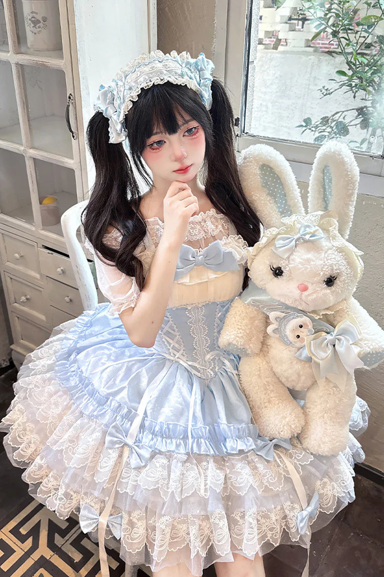Design Concept:


Step into a whimsical ballet-inspired look with this Sweet Lolita blue JSK dress. Featuring a sleeveless design, three layers of ruffles, delicate lace trim, and charming bow accents, it exudes elegance and sweetness. The lace-up detailing adds a touch of refined structure, while the flowing silhouette creates a graceful, princess-like effect. Perfect for tea parties, photoshoots, or themed gatherings, this dress combines comfort with enchanting design, making it a standout piece in any Lo