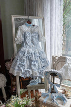 Design Concept:
Embrace a graceful and romantic style with this Sweet Lolita blue JSK dress. Designed with a sleeveless cut, cascading ruffles, and fine lace trimming, it captures an air of elegance and sweetness. The bow embellishments add a charming touch, while the layered silhouette flows beautifully for a fairytale-like appearance. Perfect for tea parties, garden strolls, or themed events, this lovely blue dress brings a soft and enchanting presence to any Lolita outfit.