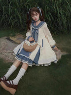Design Concept:
This Sweet Lolita dress in charming blue is designed with a romantic sailor collar and delicate bow accents, creating a youthful and elegant look. The long sleeves provide a soft, flowing silhouette, while the loose princess-style cut offers both comfort and grace. With its dreamy layered skirt, this gown evokes a fairytale-like charm that perfectly suits daily wear, festive gatherings, or tea parties.