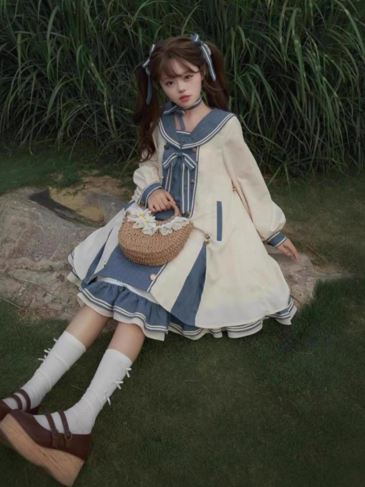 Design Concept:
This Sweet Lolita dress in charming blue is designed with a romantic sailor collar and delicate bow accents, creating a youthful and elegant look. The long sleeves provide a soft, flowing silhouette, while the loose princess-style cut offers both comfort and grace. With its dreamy layered skirt, this gown evokes a fairytale-like charm that perfectly suits daily wear, festive gatherings, or tea parties.