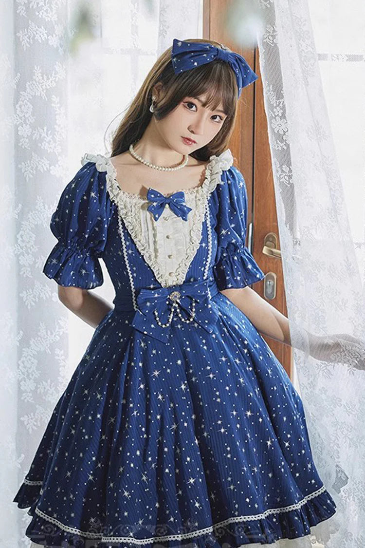 Design Concept:

This Sweet Lolita OP dress captures the dreamy essence of a midsummer galaxy night sky. Featuring a sparkling star pattern, it shimmers with celestial charm while maintaining a soft and sweet Lolita aesthetic. The short sleeves, delicate ruffles, and bow accents add playful elegance, creating a balanced design that feels both youthful and refined. With its flowing silhouette and detailed craftsmanship, this dress is perfect for tea parties, themed gatherings, or any special occasion where y