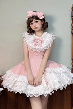 Design Concept:

This Sweet Lolita dress in soft pink features a sleeveless design with layered frills, delicate ribbon accents, and lace detailing. The asymmetric hem adds a playful and elegant touch, creating a charming princess-inspired silhouette. Perfect for cosplay, special occasions, or completing a sweet Lolita wardrobe, this dress combines a feminine aesthetic with whimsical style.