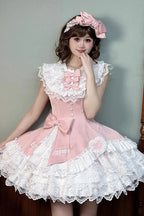 Design Concept:

This Sweet Lolita dress in soft pink features a sleeveless design with layered frills, delicate ribbon accents, and lace detailing. The asymmetric hem adds a playful and elegant touch, creating a charming princess-inspired silhouette. Perfect for cosplay, special occasions, or completing a sweet Lolita wardrobe, this dress combines a feminine aesthetic with whimsical style.