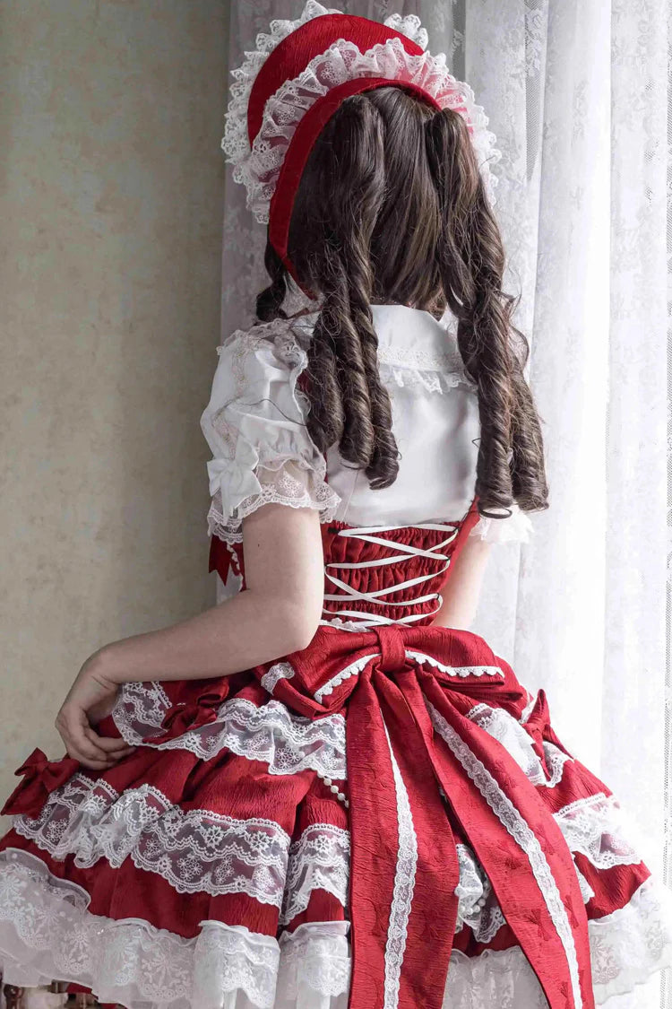 Design Concept:
Elevate your wardrobe with this Sweet Lolita red JSK dress, designed in a sleeveless style with layered ruffles, delicate lace, and dainty ribbon bow accents. The vibrant red hue brings a bold yet graceful charm, while the cascading silhouette creates a dreamy and romantic aesthetic. Perfect for tea parties, photoshoots, or elegant gatherings, this dress captures the essence of sweet Lolita fashion with its enchanting details and flattering design. Comfortable and versatile, it’s a must-have