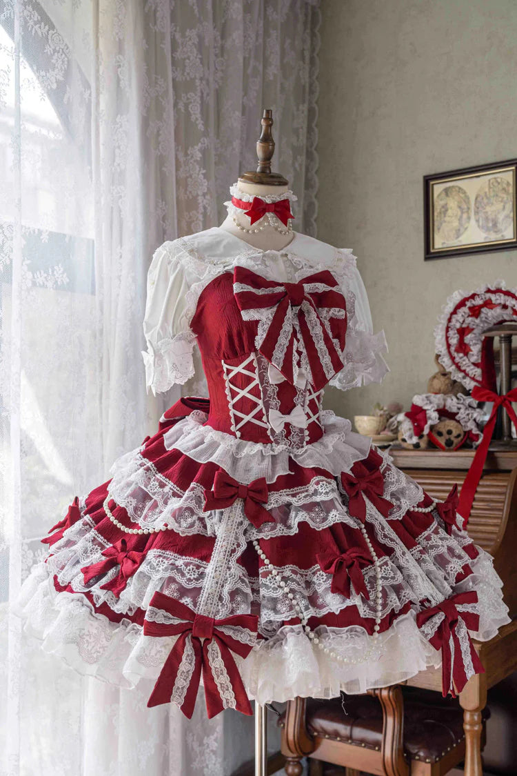 Design Concept:
Elevate your wardrobe with this Sweet Lolita red JSK dress, designed in a sleeveless style with layered ruffles, delicate lace, and dainty ribbon bow accents. The vibrant red hue brings a bold yet graceful charm, while the cascading silhouette creates a dreamy and romantic aesthetic. Perfect for tea parties, photoshoots, or elegant gatherings, this dress captures the essence of sweet Lolita fashion with its enchanting details and flattering design. Comfortable and versatile, it’s a must-have