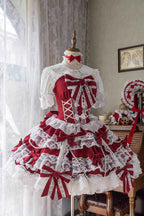 Design Concept:
Elevate your wardrobe with this Sweet Lolita red JSK dress, designed in a sleeveless style with layered ruffles, delicate lace, and dainty ribbon bow accents. The vibrant red hue brings a bold yet graceful charm, while the cascading silhouette creates a dreamy and romantic aesthetic. Perfect for tea parties, photoshoots, or elegant gatherings, this dress captures the essence of sweet Lolita fashion with its enchanting details and flattering design. Comfortable and versatile, it’s a must-have
