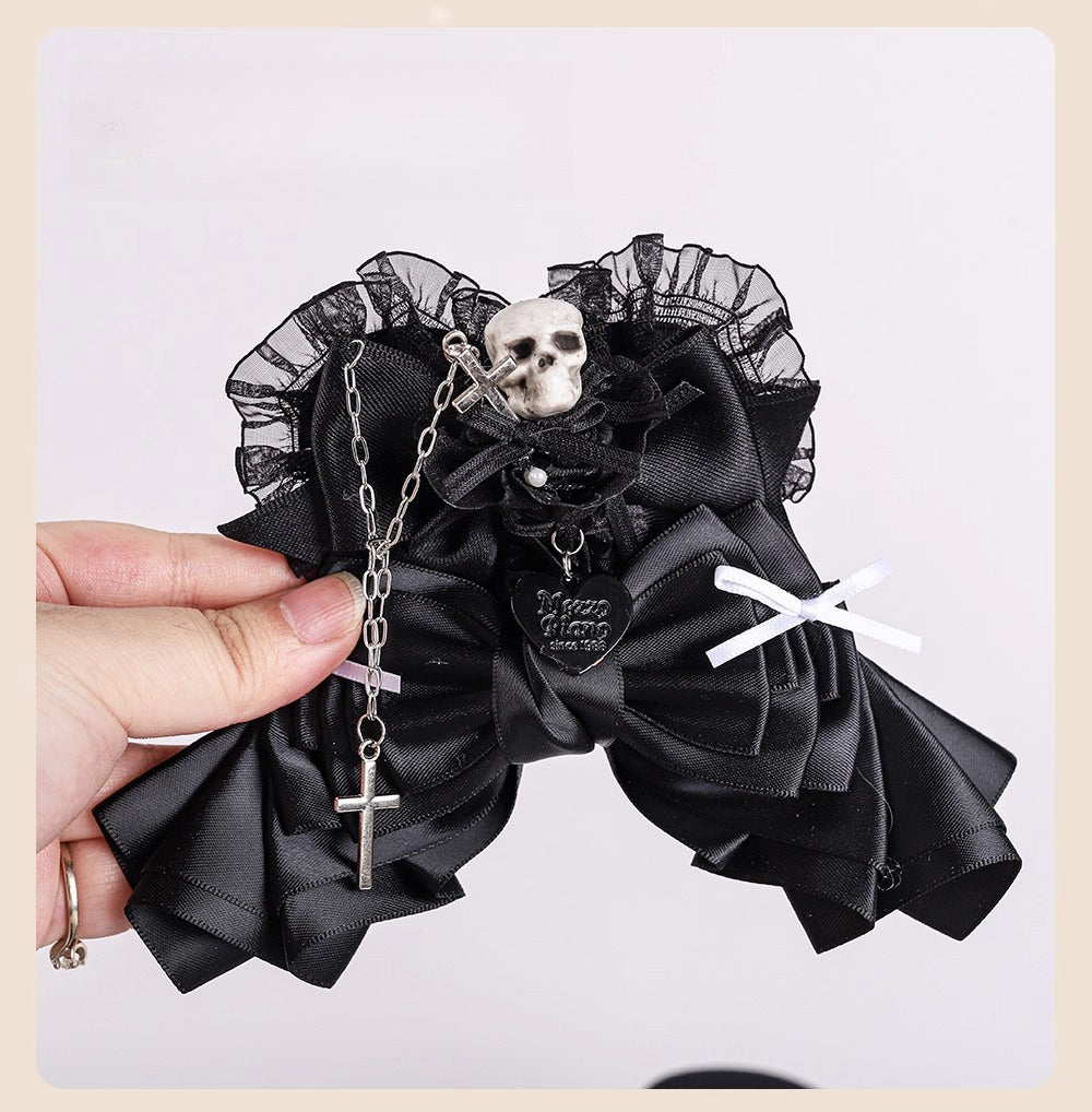 Design Concept:
This Gothic-inspired accessory embraces the eerie elegance of a Skull Bride theme. Crafted in black with a striking skull heart design, the piece is accented by a delicate cross motif, blending dark romance with Lolita charm. The lace details enhance its vintage flair, making it a statement piece for cosplay events, themed parties, or collectors of gothic accessories.