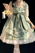 Design Concept:

This enchanting Qi Lolita JSK dress blends Chinese-inspired elements with a whimsical rainbow fairy aesthetic. Crafted from soft, high-quality fabric, the dress features a graceful silhouette, delicate ruffles, and subtle embroidered details that enhance its sweet and elegant charm. The full set includes a matching inner blouse and coordinating accessories, allowing for a complete outfit right out of the box. Available in three captivating colors—green, red, and black—this dress is perfect 