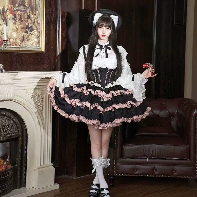 Design Concept:

This Sweet Lolita black and pink suspender cake skirt features a playful yet elegant design with a large bow and trailing detail, creating a charming and eye-catching look. Product Details: The product includes one suspender cake skirt only, offering a unique piece that pairs well with various tops for a cute and stylish Lolita outfit.