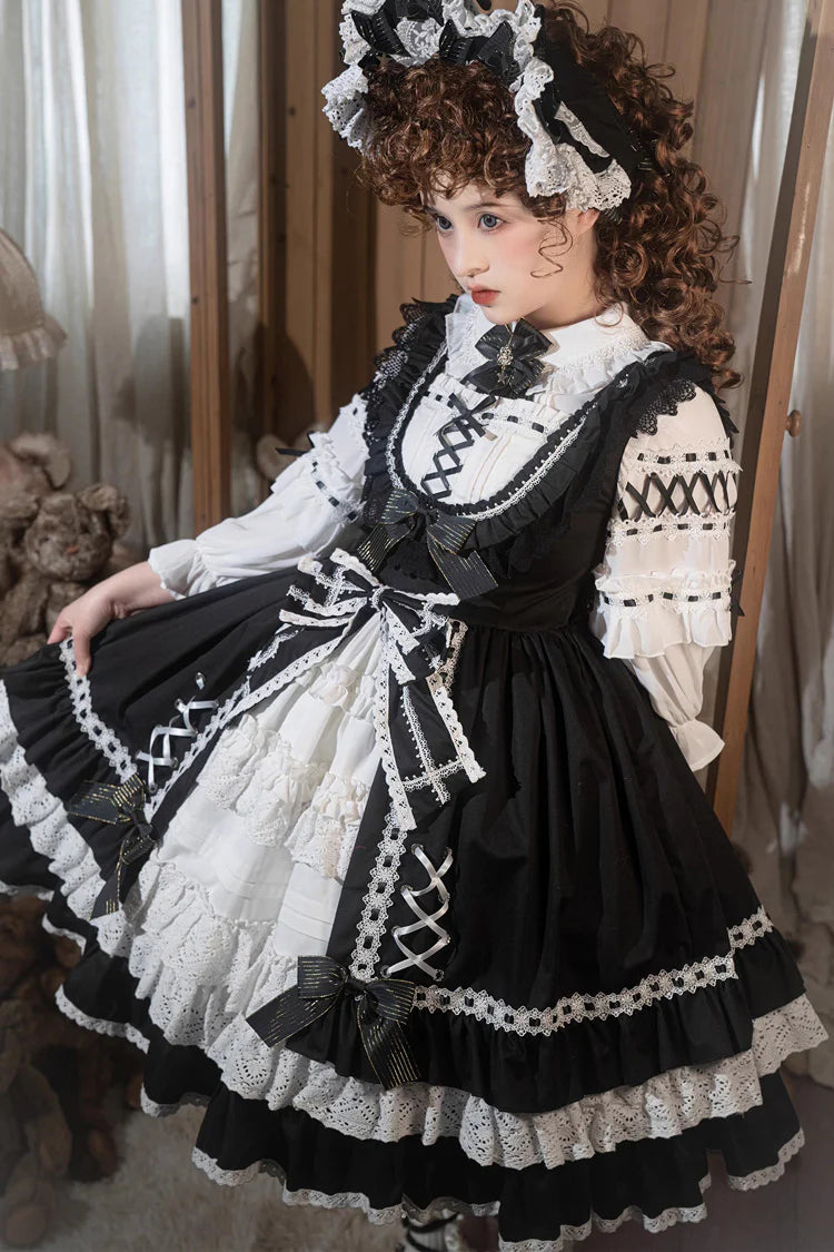 Design Concept:&nbsp;

This Sweet Lolita black and white sleeveless JSK dress features layered ruffles, delicate lace, and bow details, creating a soft and elegant Lolita style. The contrasting colors highlight its sweet yet refined design, making it a versatile choice for various occasions. The product includes one JSK dress.
