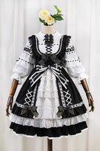 Design Concept:&nbsp;

This Sweet Lolita black and white sleeveless JSK dress features layered ruffles, delicate lace, and bow details, creating a soft and elegant Lolita style. The contrasting colors highlight its sweet yet refined design, making it a versatile choice for various occasions. The product includes one JSK dress.