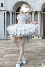 Design Concept:&nbsp;

Immerse yourself in a fairy tale with this complete Sweet Lolita coord set. The set features a beautiful blue colorway with an all-over delicate floral print, perfect for creating a sweet and romantic look. The centerpiece is a Jumperskirt (JSK) dress, adorned with multi-layered ruffles, intricate lace, and a charming bow detail. The matching blouse complements the dress perfectly, creating a harmonious and fully styled silhouette.