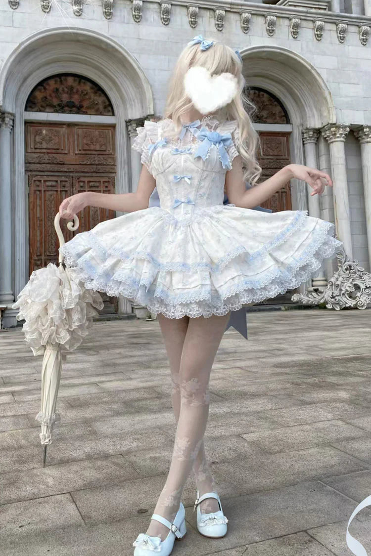 Design Concept:&nbsp;

Immerse yourself in a fairy tale with this complete Sweet Lolita coord set. The set features a beautiful blue colorway with an all-over delicate floral print, perfect for creating a sweet and romantic look. The centerpiece is a Jumperskirt (JSK) dress, adorned with multi-layered ruffles, intricate lace, and a charming bow detail. The matching blouse complements the dress perfectly, creating a harmonious and fully styled silhouette.