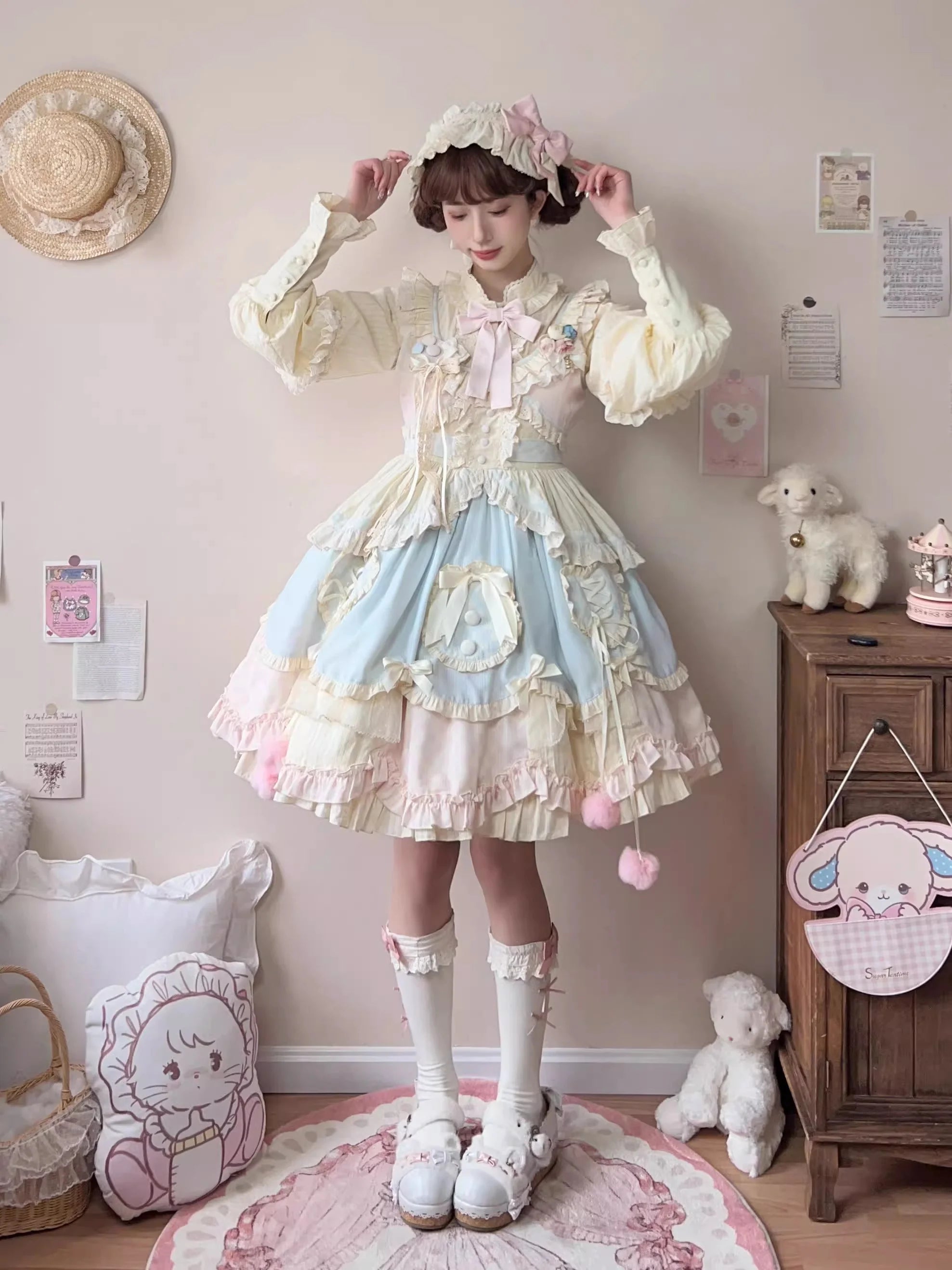 Design Concept:

This Sweet Lolita blue and pink sleeveless JSK dress features layered ruffles, delicate lace, and charming bow details, creating a sweet and playful style. The short version design adds a light and youthful touch, perfect for showcasing a cute Lolita look. Product Details: The product includes one dress, offering a dreamy and elegant outfit for special occasions or daily Lolita fashion.