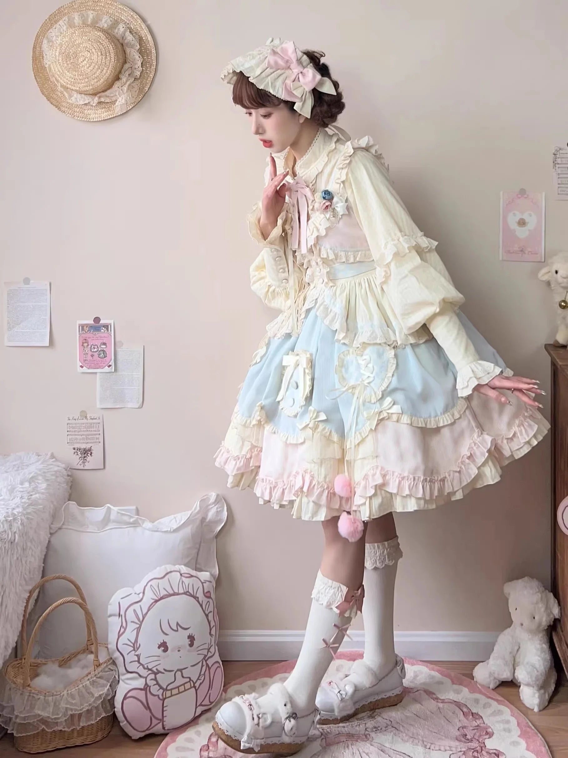 Design Concept:

This Sweet Lolita blue and pink sleeveless JSK dress features layered ruffles, delicate lace, and charming bow details, creating a sweet and playful style. The short version design adds a light and youthful touch, perfect for showcasing a cute Lolita look. Product Details: The product includes one dress, offering a dreamy and elegant outfit for special occasions or daily Lolita fashion.