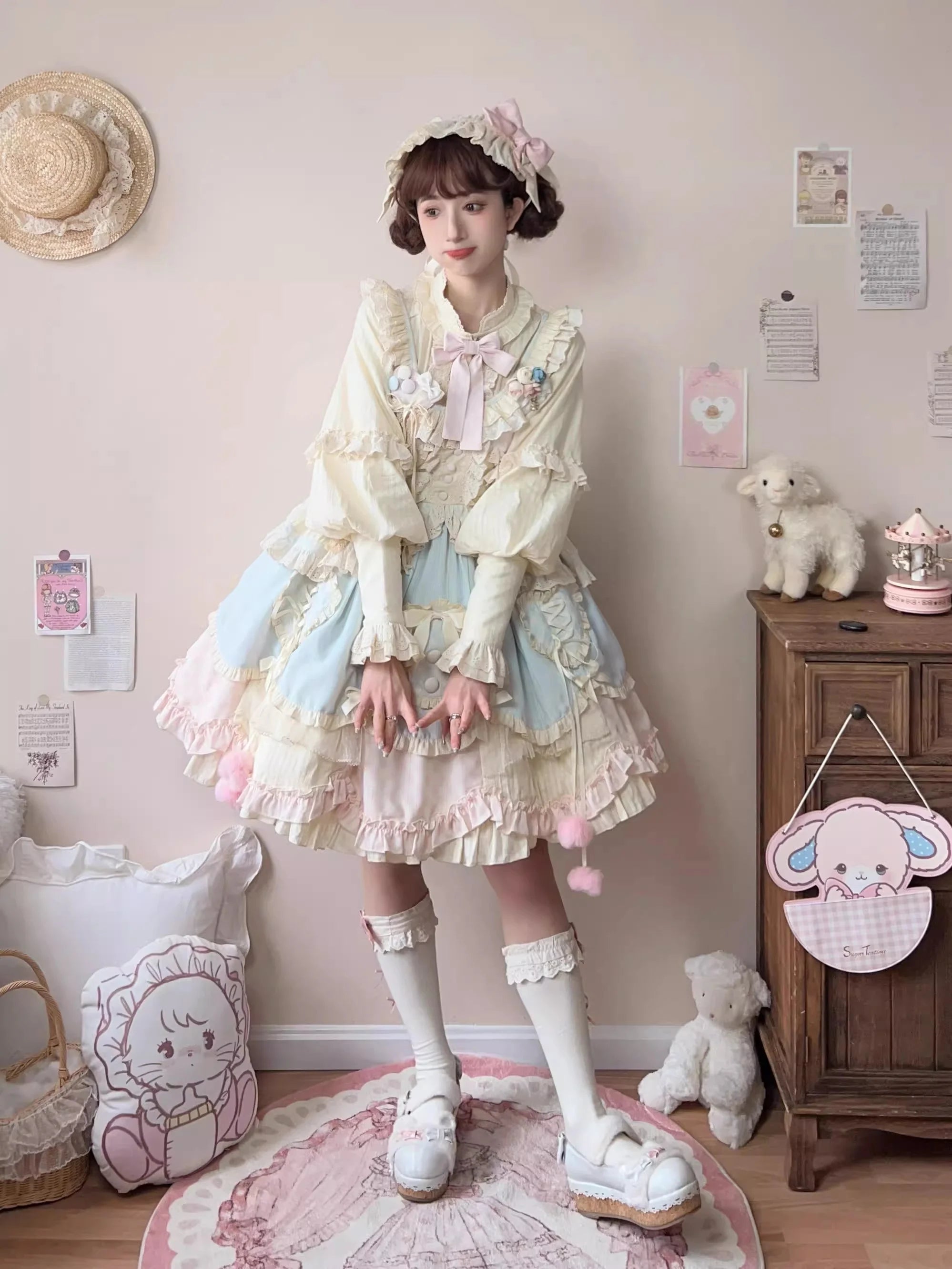 Design Concept:

This Sweet Lolita blue and pink sleeveless JSK dress features layered ruffles, delicate lace, and charming bow details, creating a sweet and playful style. The short version design adds a light and youthful touch, perfect for showcasing a cute Lolita look. Product Details: The product includes one dress, offering a dreamy and elegant outfit for special occasions or daily Lolita fashion.